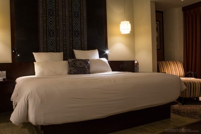 Cama king size na suíte deluxe no hotel em Lombok